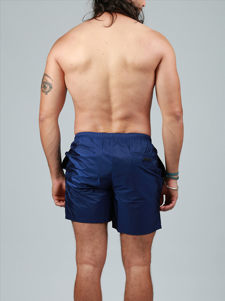 Prada swim trunks, luxury men's swimwear, blue swim shorts, high-end beachwear, designer swimwear