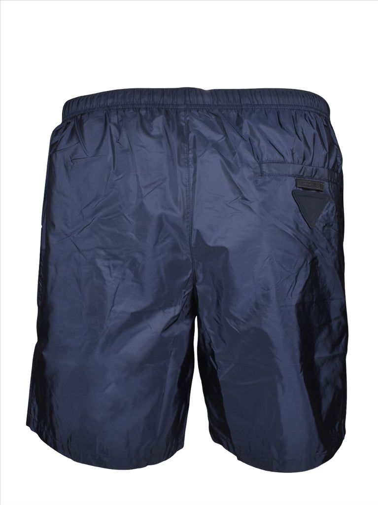 Prada, men's swim trunks, luxury swimwear, blue swim shorts, designer swimwear
**