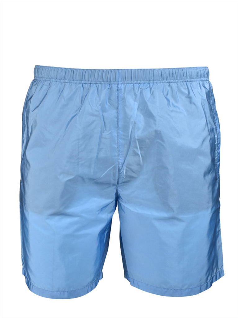 Prada swim trunks, luxury swimwear, men's blue trunks, designer swimwear, high-end summer fashion