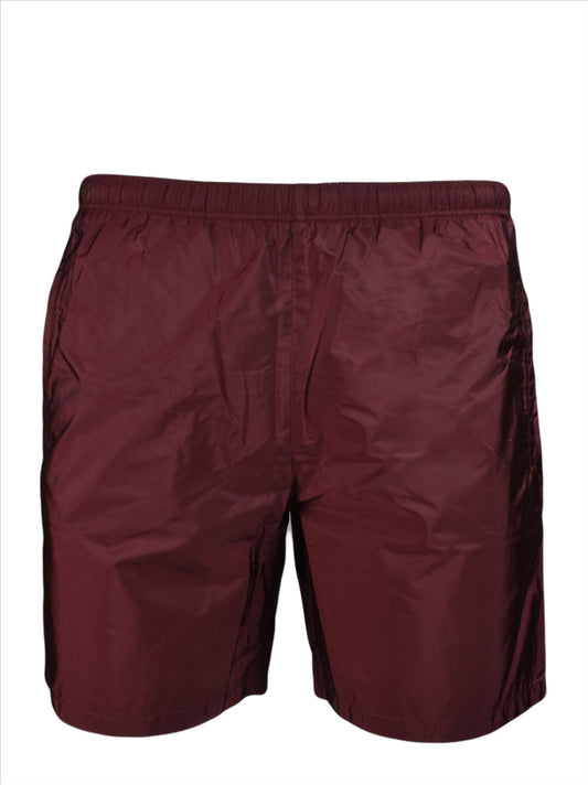 Prada swim shorts, luxury swimwear, bordeaux swim shorts, men’s designer swimwear, high-end swim shorts