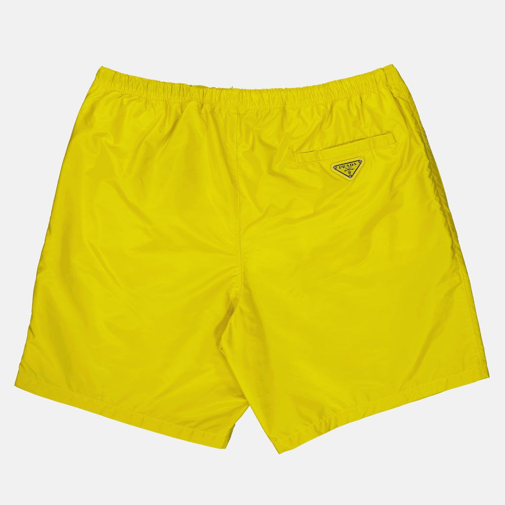 Image of Yellow Re-Nylon Swim Shorts by Prada for Men - Season Spring-Summer 2023 - Product detail view 1