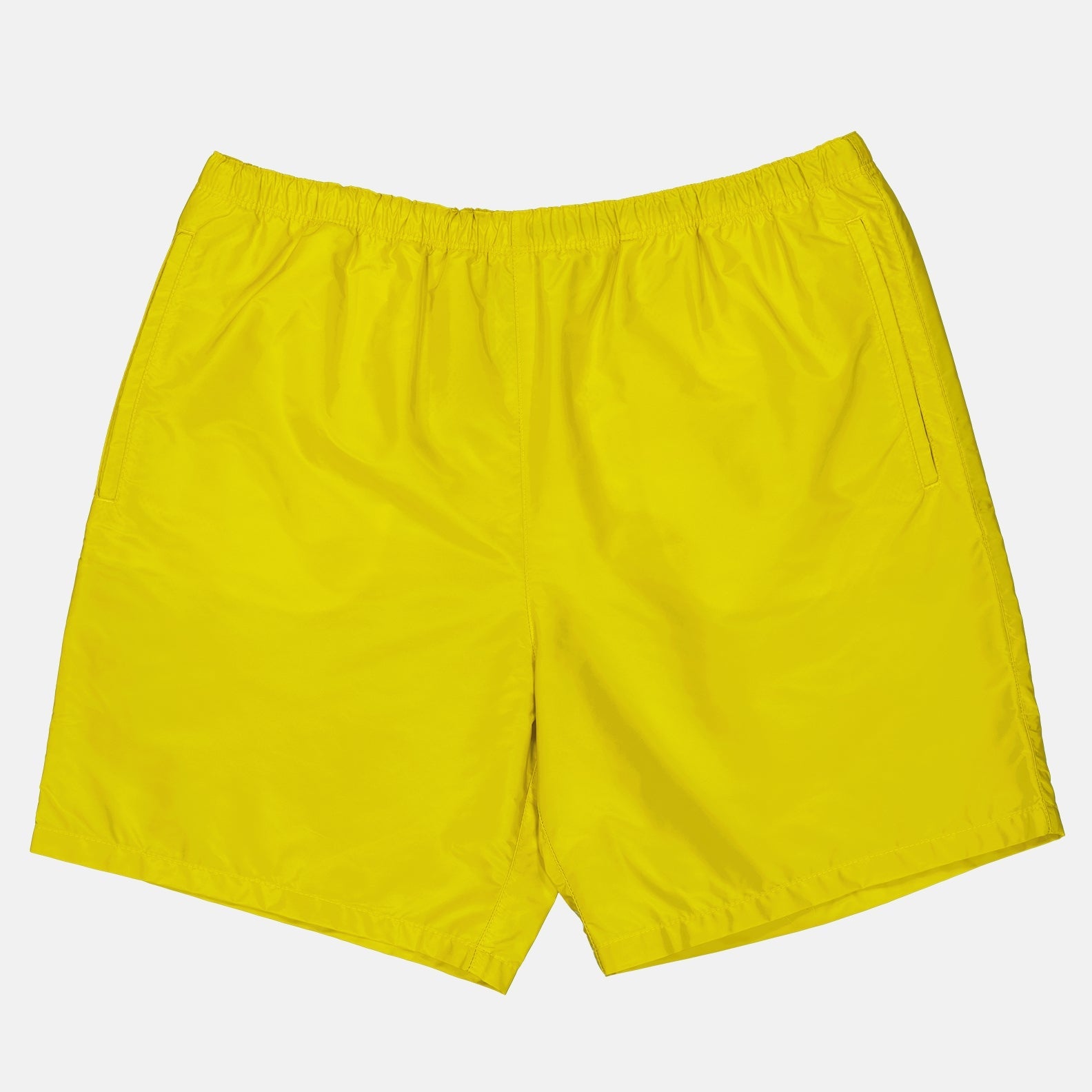 Prada swim shorts, Re-Nylon swimwear, luxury men's swimwear, sustainable beachwear, yellow swim trunks