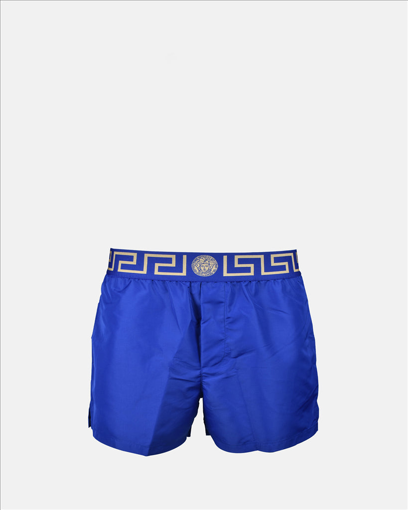 Versace swim trunks, luxury swimwear, Medusa pattern, men's designer swimwear, blue swim trunks