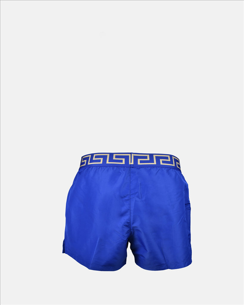 Versace swim trunks, luxury swimwear, Medusa pattern, men's designer swimwear, blue swim trunks