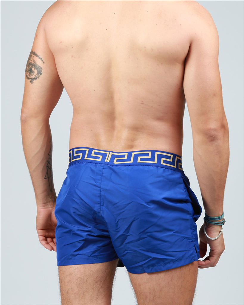 Versace swim trunks, luxury swimwear, Medusa pattern, men's designer swimwear, blue swim trunks