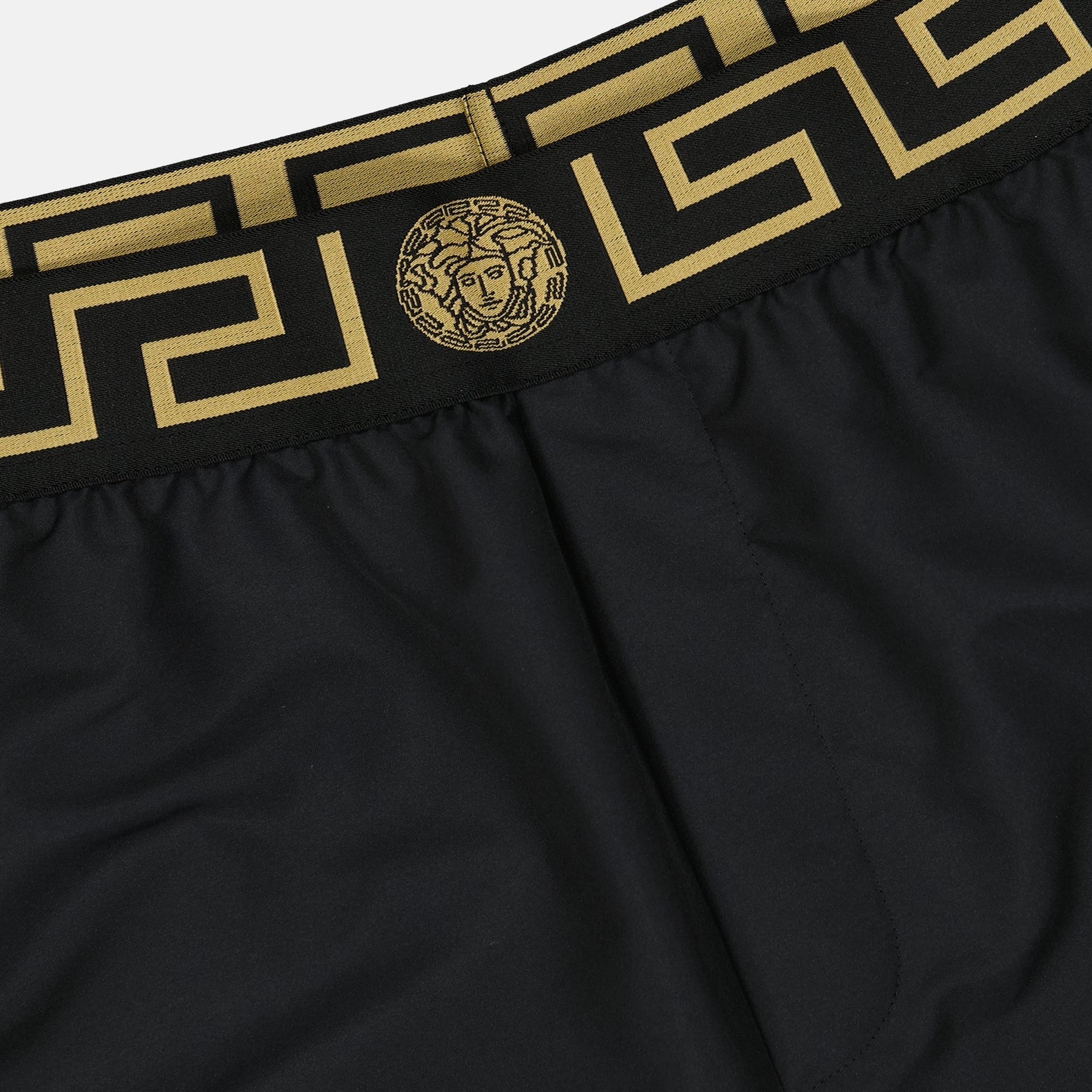 Versace swimwear, men's luxury swimwear, black designer swimwear, Medusa swimwear, high-end men's fashion