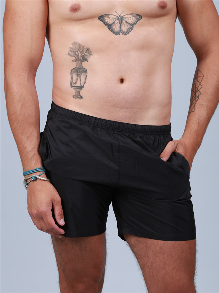 Prada swim trunks, luxury swimwear, black swim trunks, high-end swimwear, men's fashion