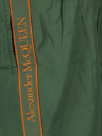 luxury swim shorts, Alexander McQueen, khaki swim shorts, logo swimwear, designer beachwear