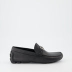 Dior moccasins, luxury black loafers, men's designer shoes, high-end footwear, elegant men's shoes  
