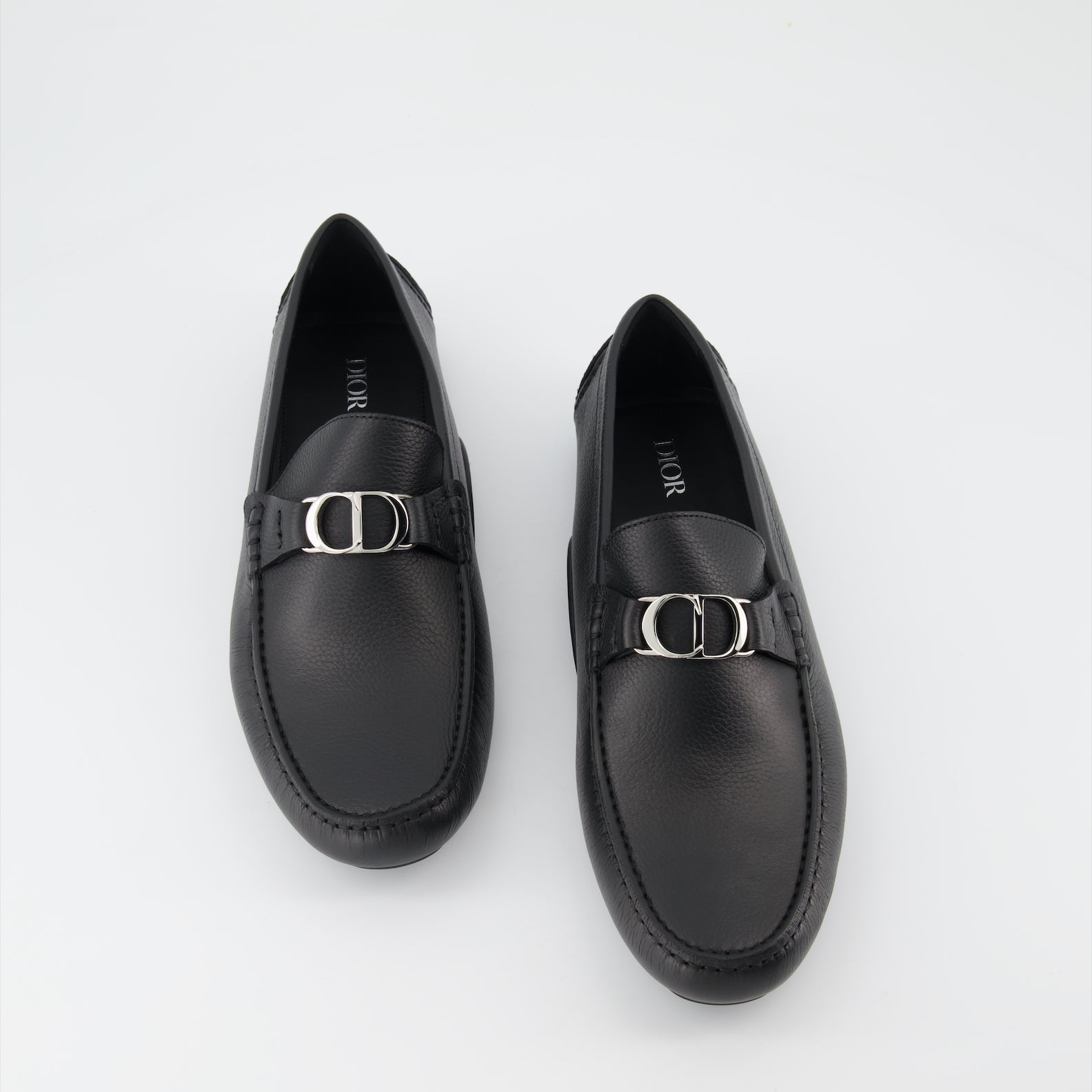 Dior moccasins, luxury black loafers, men's designer shoes, high-end footwear, elegant men's shoes  
