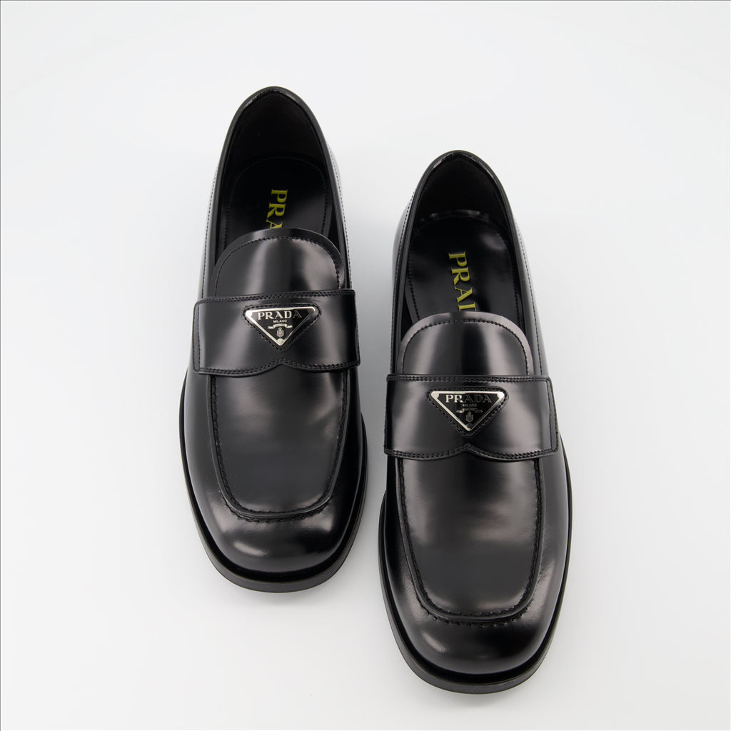 Prada loafers, premium leather, triangle logo, masculine elegance, luxurious comfort