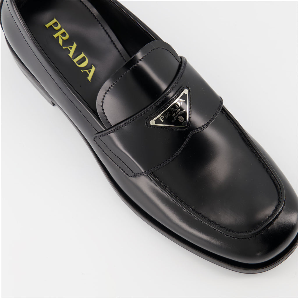 Prada loafers, premium leather, triangle logo, masculine elegance, luxurious comfort