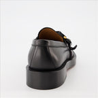 Men's loafers, leather shoes, masculine elegance, timeless luxury, chic comfort.
