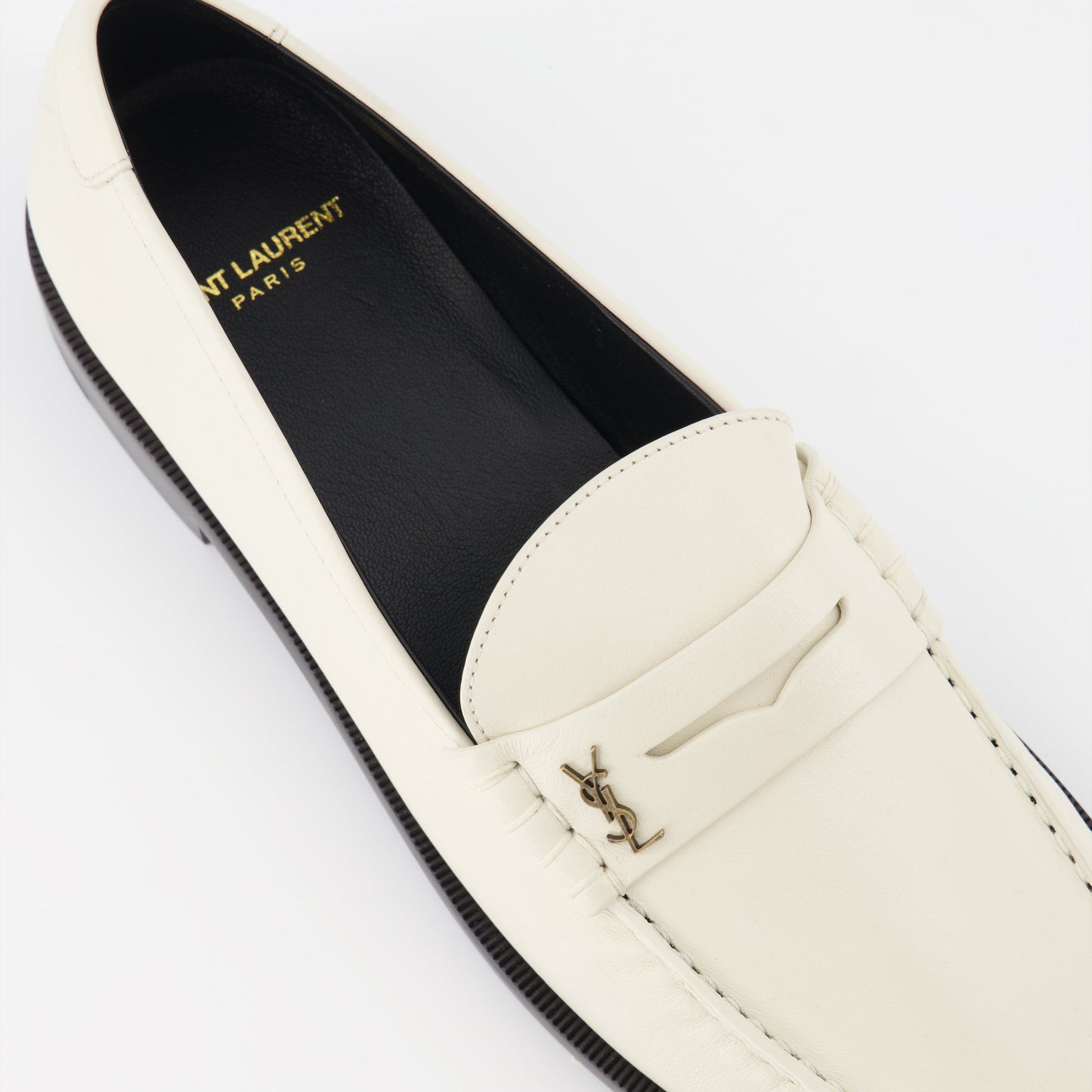 Saint Laurent loafers, white moccasins, men's luxury shoes, designer footwear, elegant men's loafers