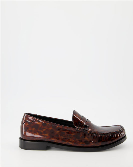 Patent loafers, tortoiseshell print, Saint Laurent, masculine elegance, luxury footwear