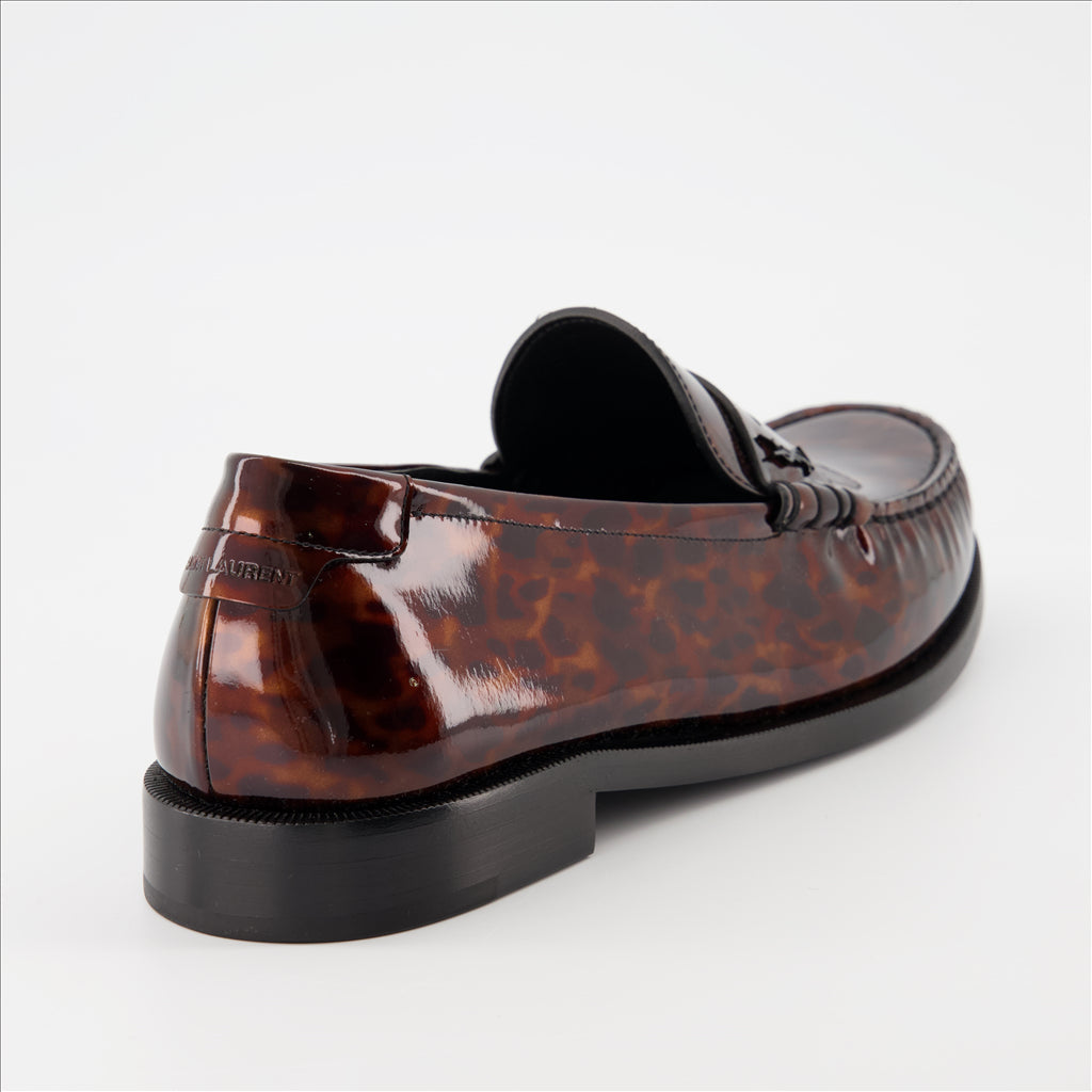 Patent loafers, tortoiseshell print, Saint Laurent, masculine elegance, luxury footwear