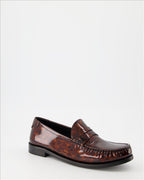 Patent loafers, tortoiseshell print, Saint Laurent, masculine elegance, luxury footwear