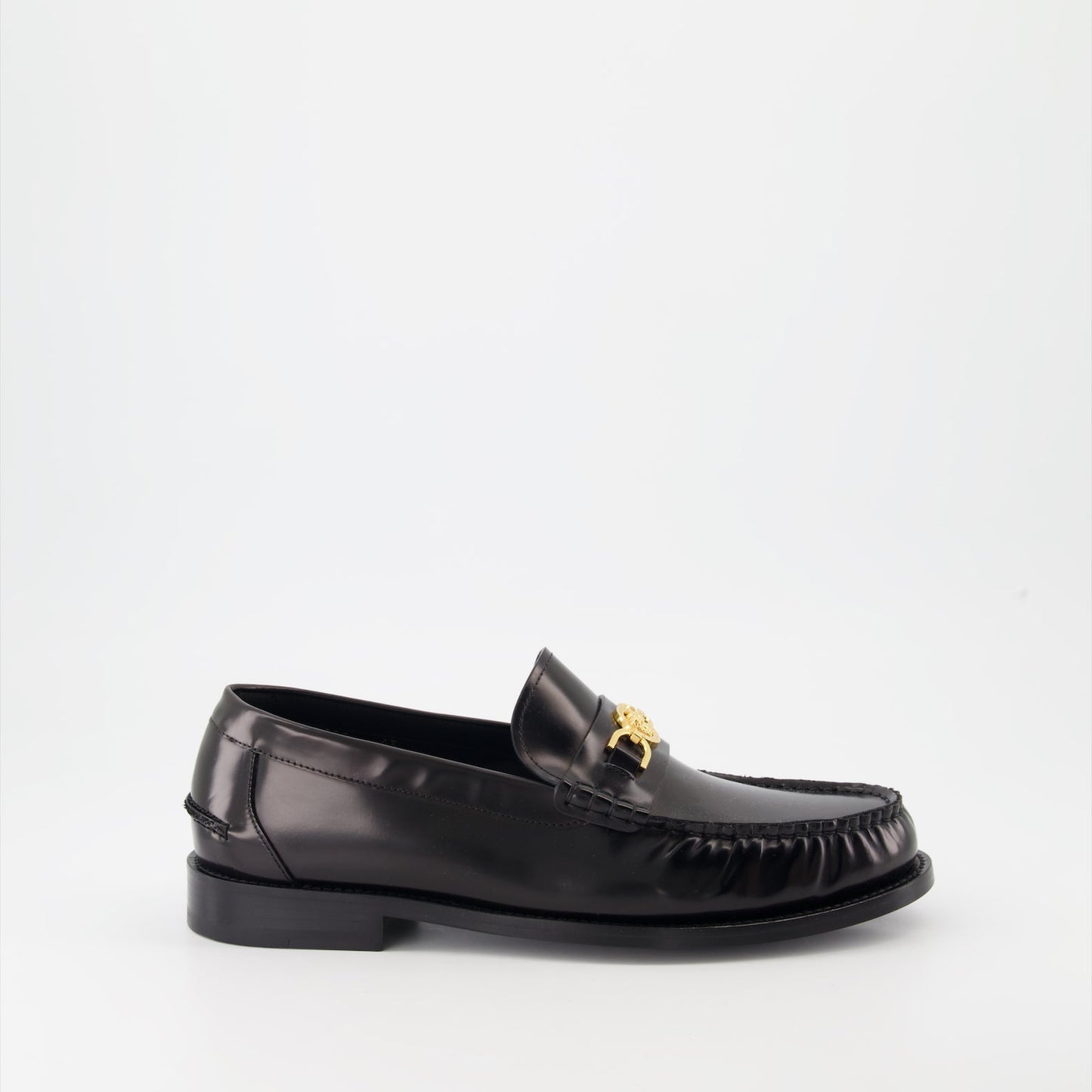 Versace moccasins, luxury leather shoes, Medusa emblem footwear, elegant designer shoes, high-end men's shoes