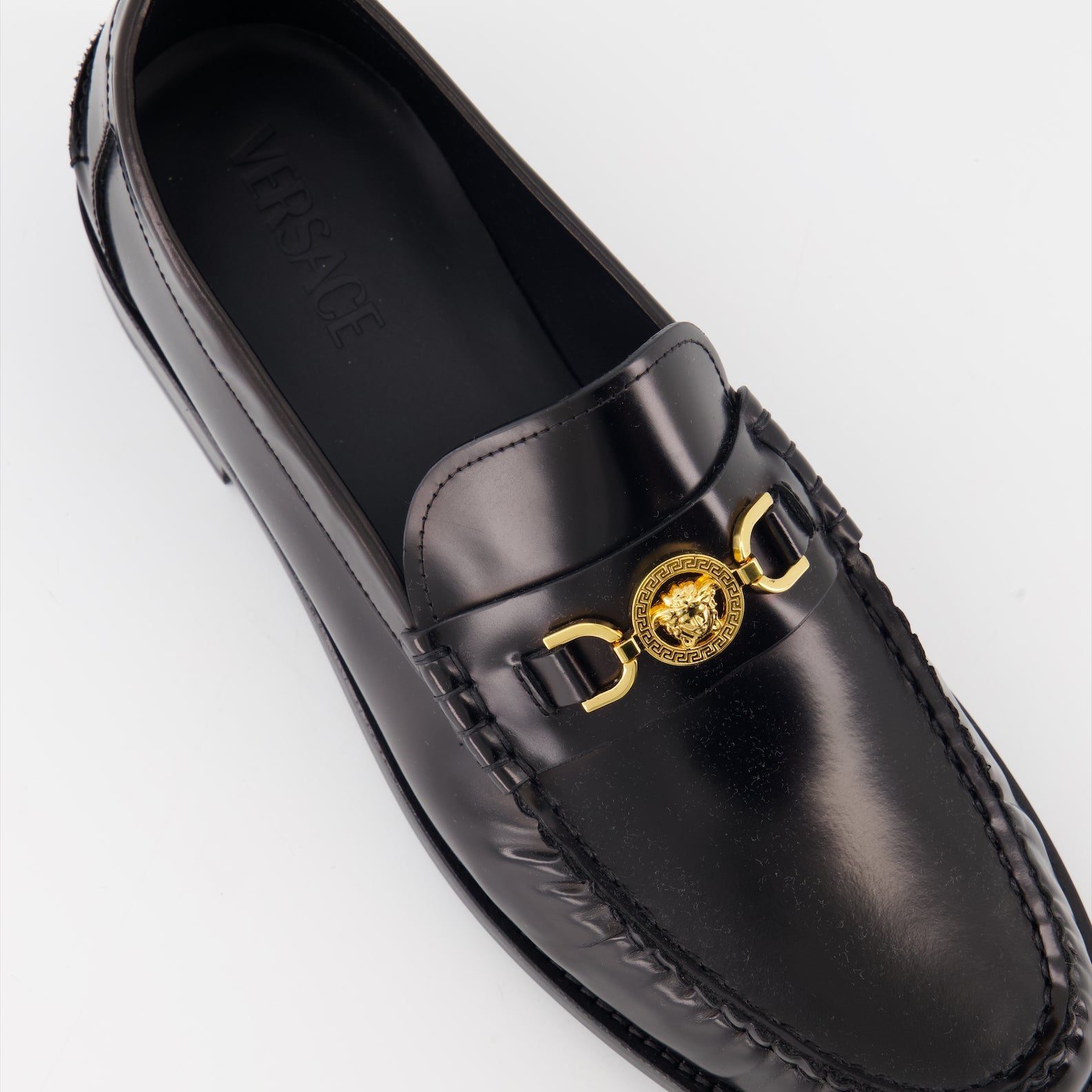 Versace moccasins, luxury leather shoes, Medusa emblem footwear, elegant designer shoes, high-end men's shoes