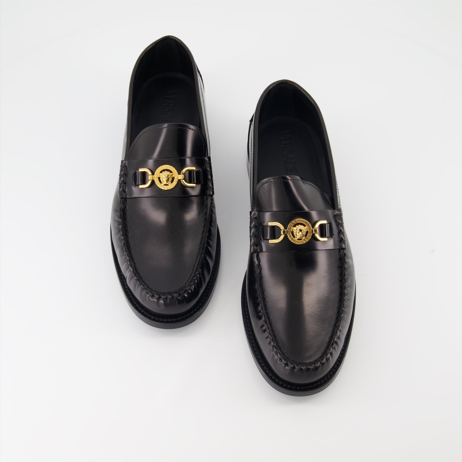 Versace moccasins, luxury leather shoes, Medusa emblem footwear, elegant designer shoes, high-end men's shoes