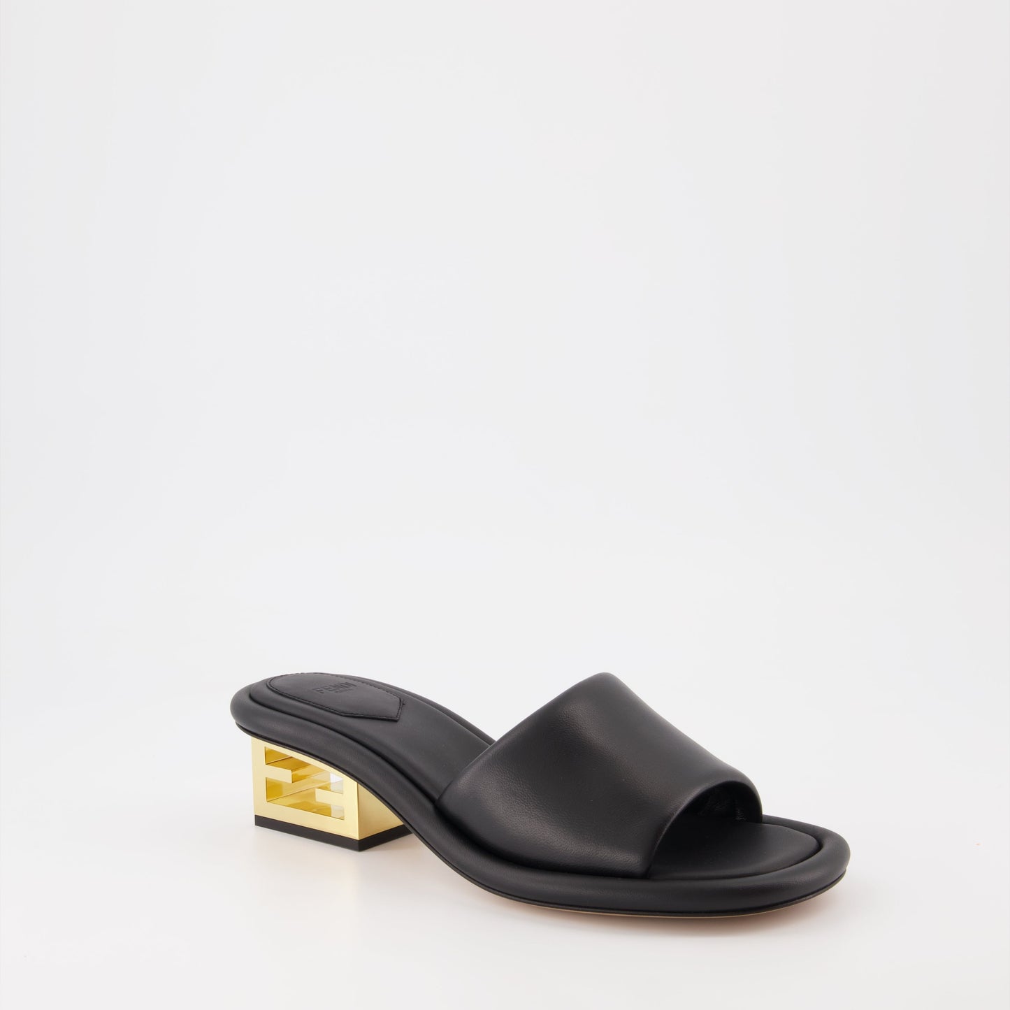 Fendi mules, black leather mules, luxury women's footwear, Fendi Baguette, designer women's shoes