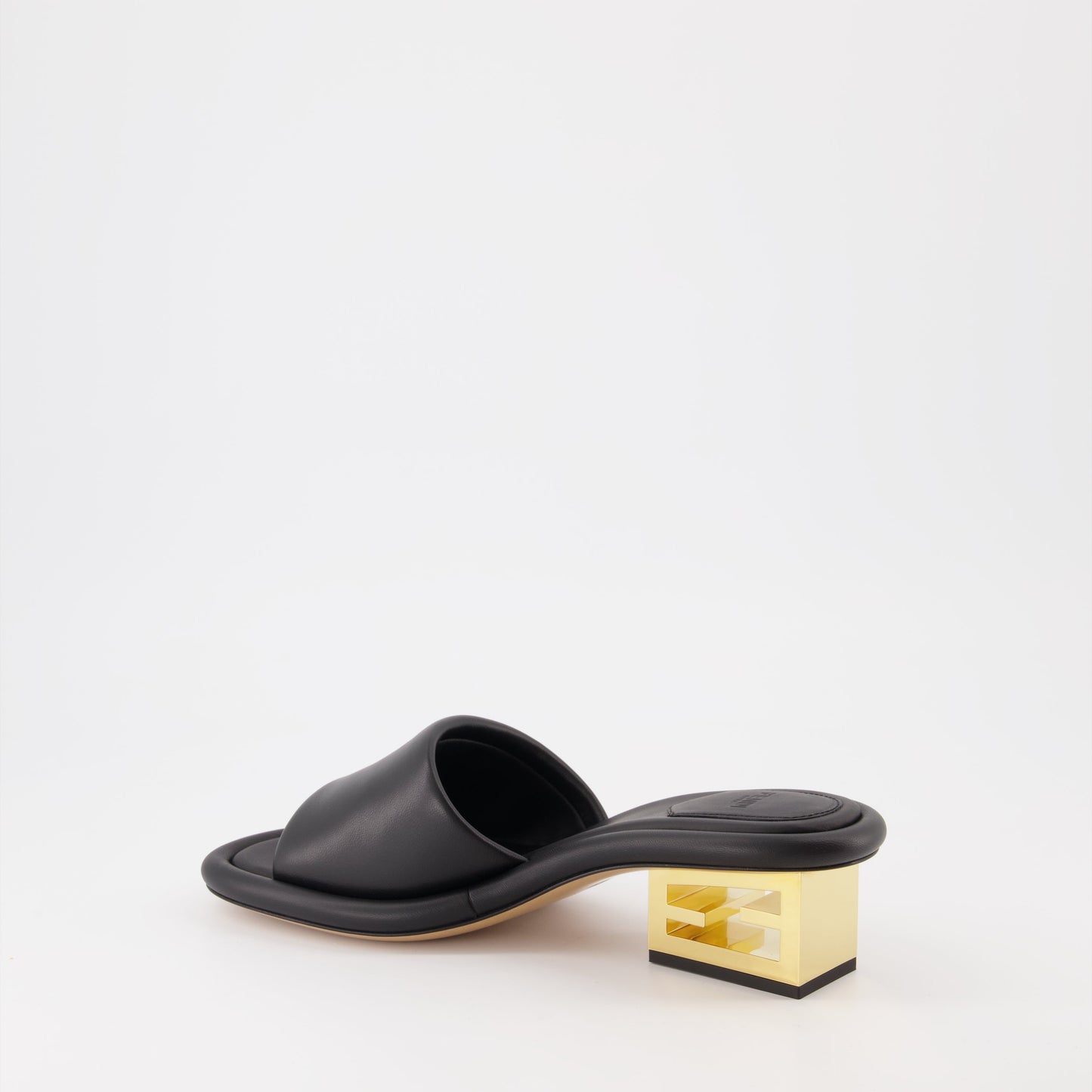 Fendi mules, black leather mules, luxury women's footwear, Fendi Baguette, designer women's shoes