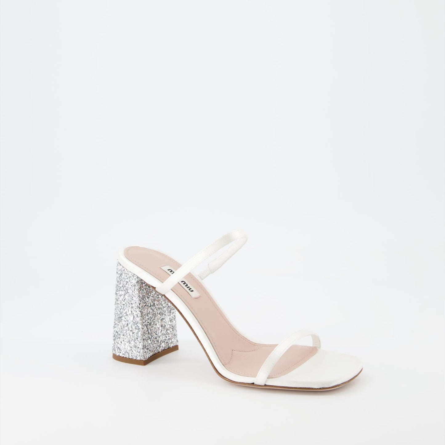 Miu Miu glitter mules, luxury white mules, women’s sparkling shoes, elegant designer footwear, glamorous mules