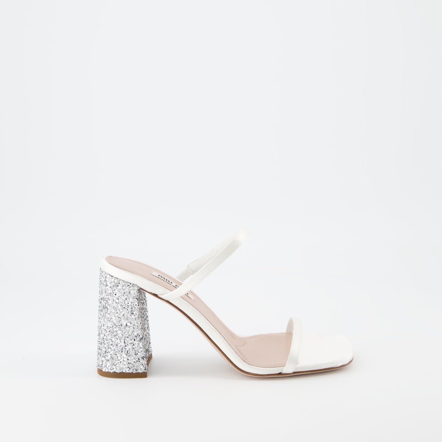 Miu Miu glitter mules, luxury white mules, women’s sparkling shoes, elegant designer footwear, glamorous mules