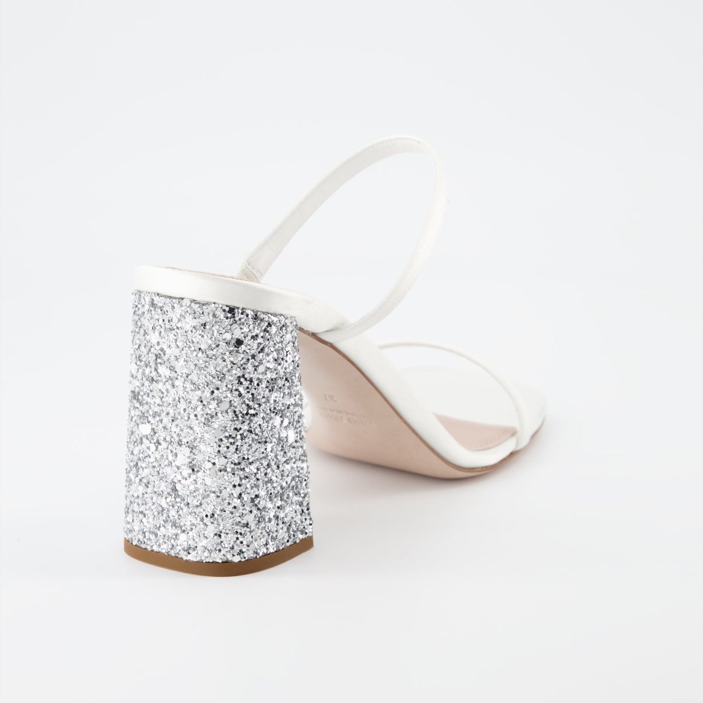 Miu Miu glitter mules, luxury white mules, women’s sparkling shoes, elegant designer footwear, glamorous mules