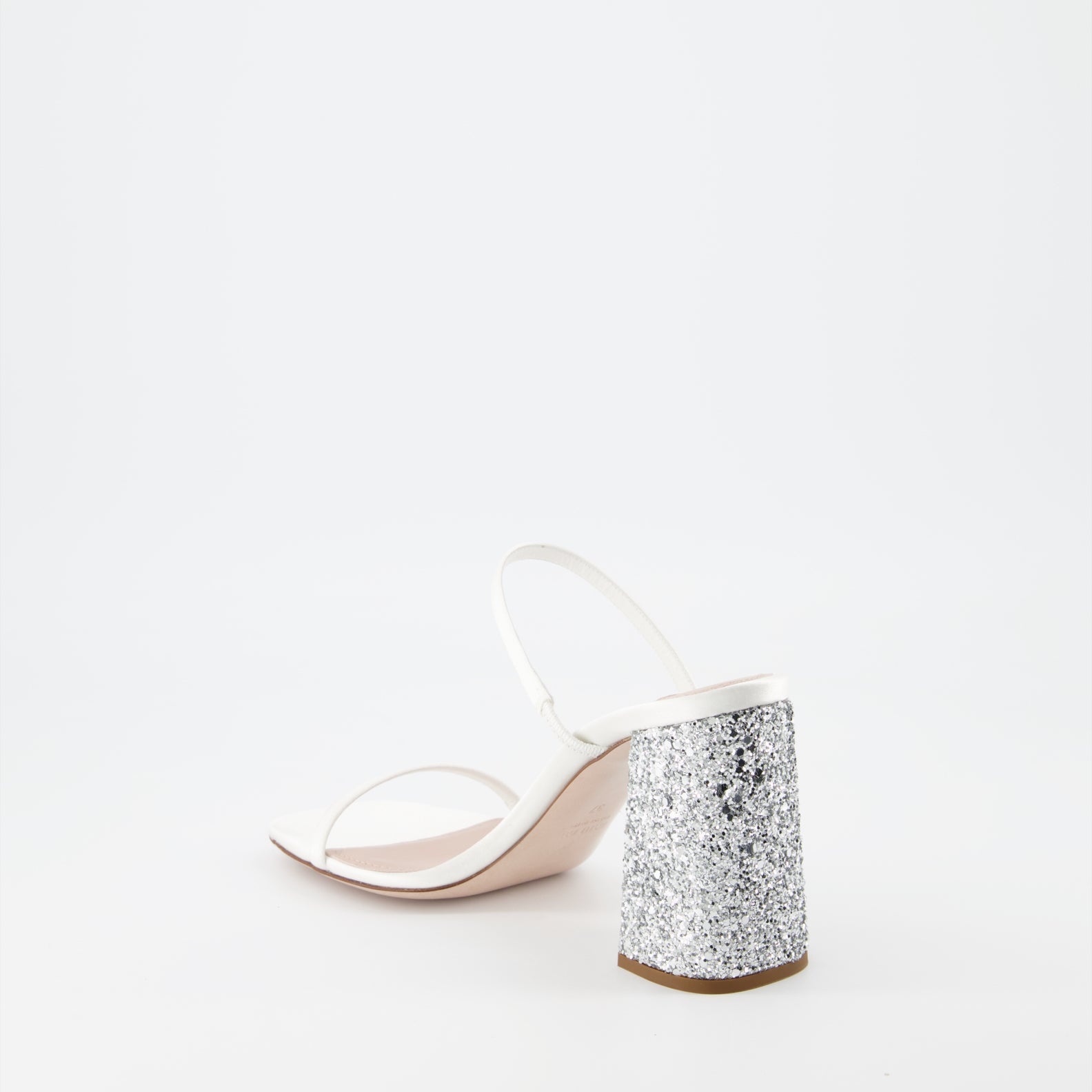 Miu Miu glitter mules, luxury white mules, women’s sparkling shoes, elegant designer footwear, glamorous mules