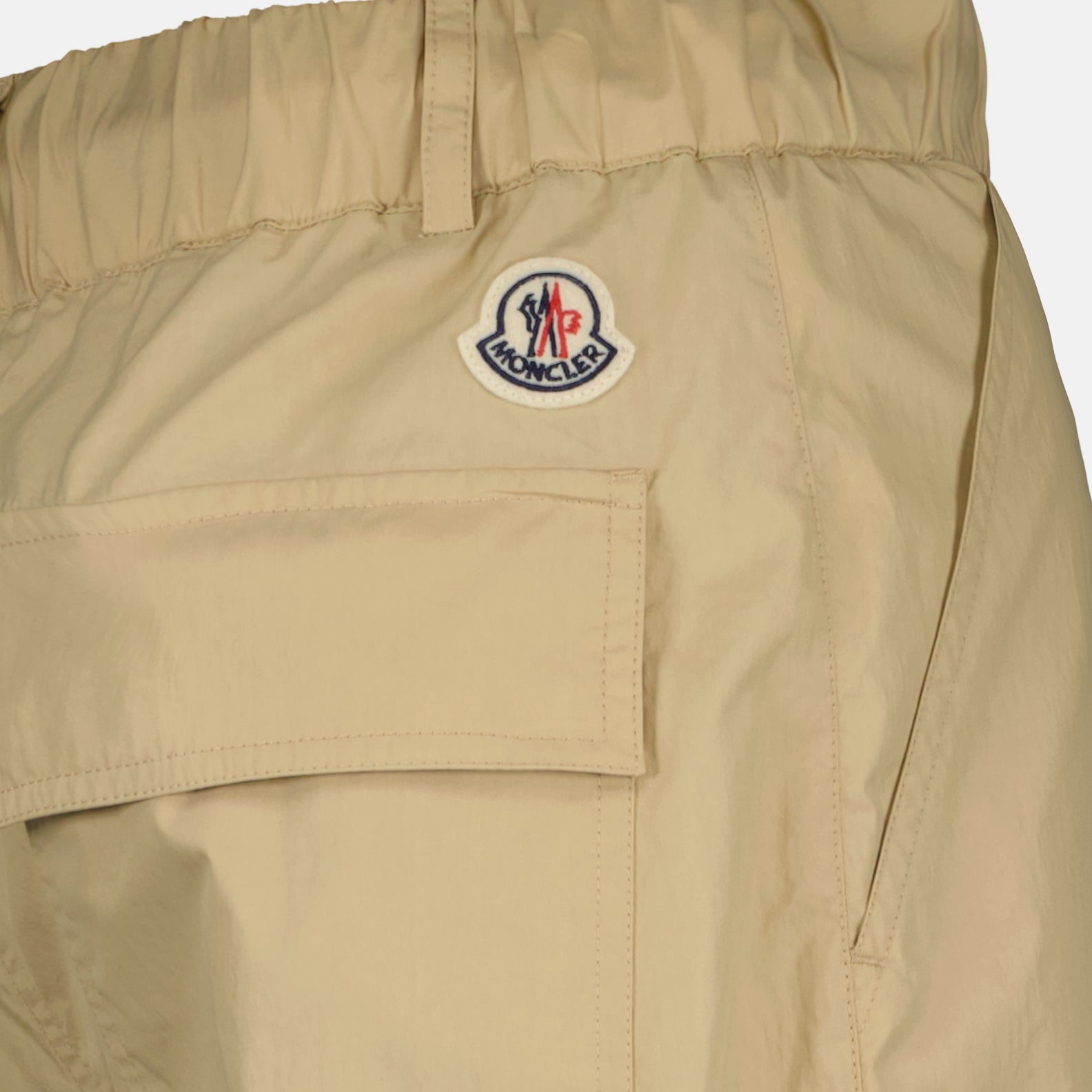 Moncler chinos, beige chino pants, men's luxury pants, high-end trousers, designer chinos