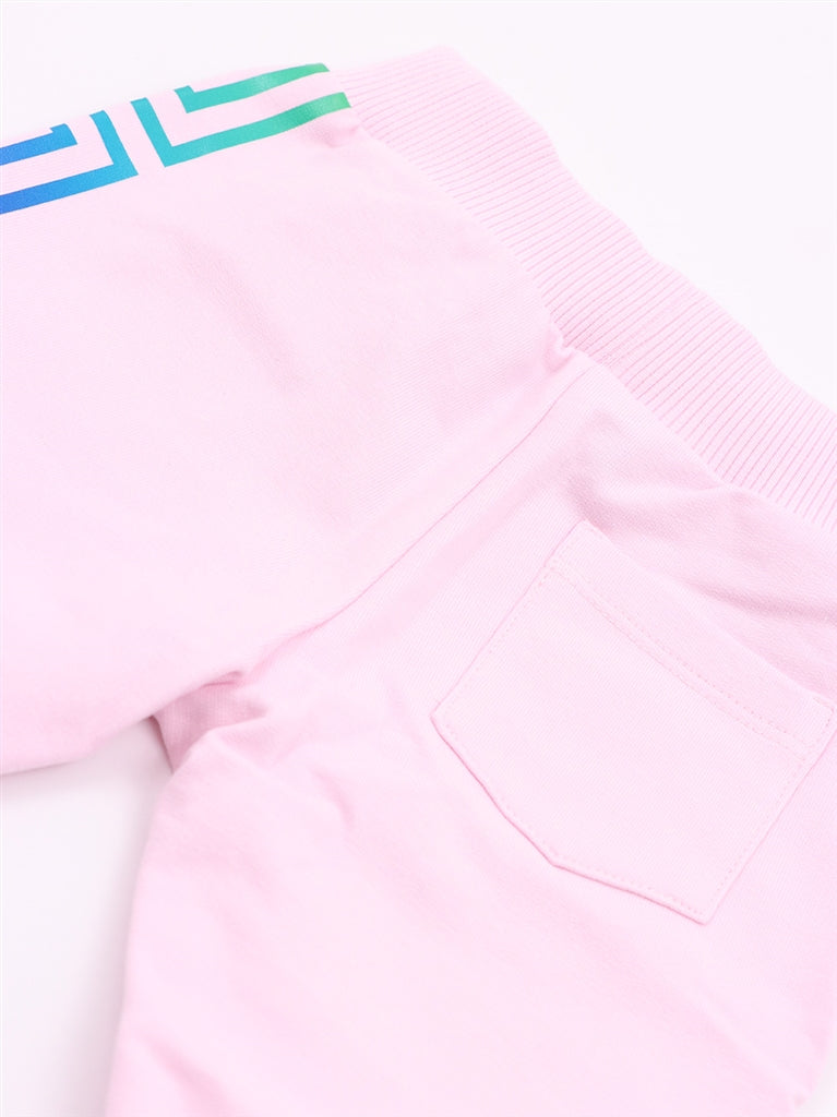 Versace kids, luxury children's fashion, neon pants, Greca pattern, high-end kidswear