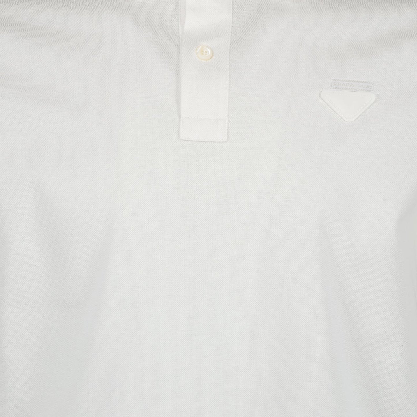 Prada, white polo, luxury menswear, designer clothing, high-end fashion