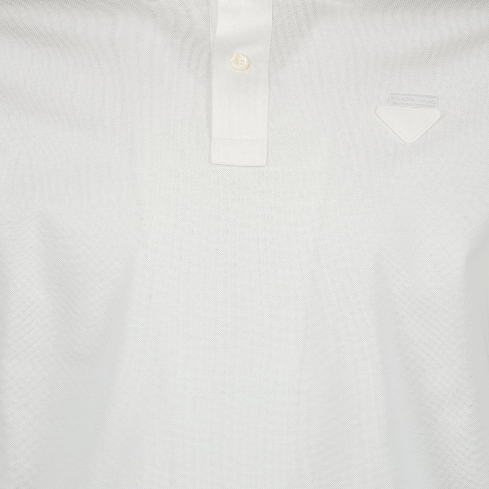 Prada, white polo, luxury menswear, designer clothing, high-end fashion