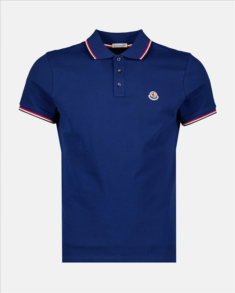 - Men's Moncler Polo
- Deluxe Navy Blue
- Piqué Cotton
- Trendy Logo
- Tailored Fit