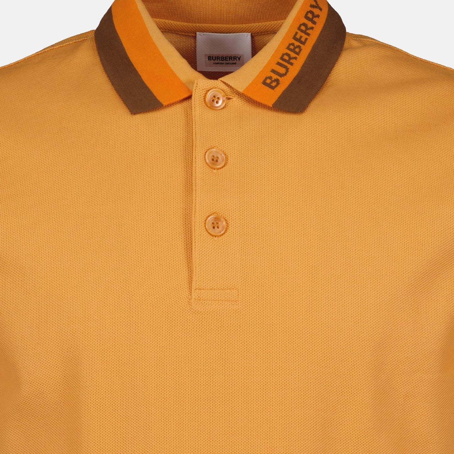 Burberry polo, luxury men's polo, orange Burberry shirt, designer menswear, high-end casual wear