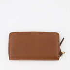 brown leather wallet, luxury women's accessory, grained leather wallet, embossed logo, elegant women's wallet