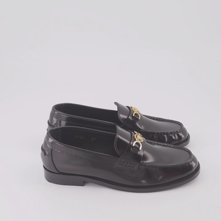 Versace moccasins, luxury women's footwear, Medusa emblem shoes, black leather moccasins, high-end women's shoes