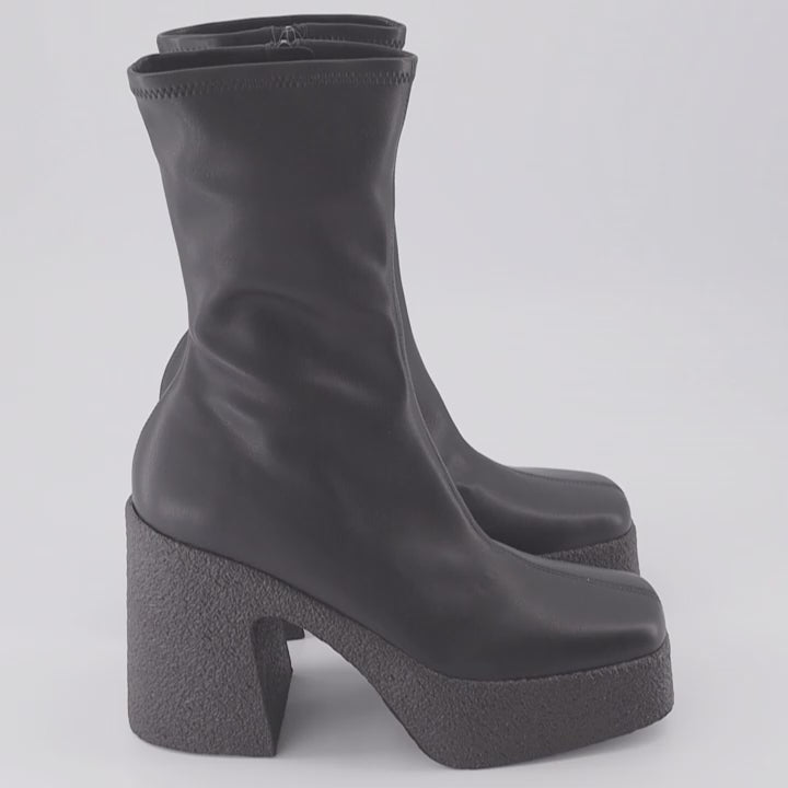 Stella McCartney, platform ankle boots, black ankle boots, women's luxury footwear, sustainable fashion