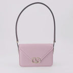 Valentino Garavani, light pink bag, VLogo bag, luxury envelope bag, women's designer bag