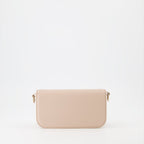 beige handbag, luxury bag, Valentino Garavani, designer accessory, elegant handbag