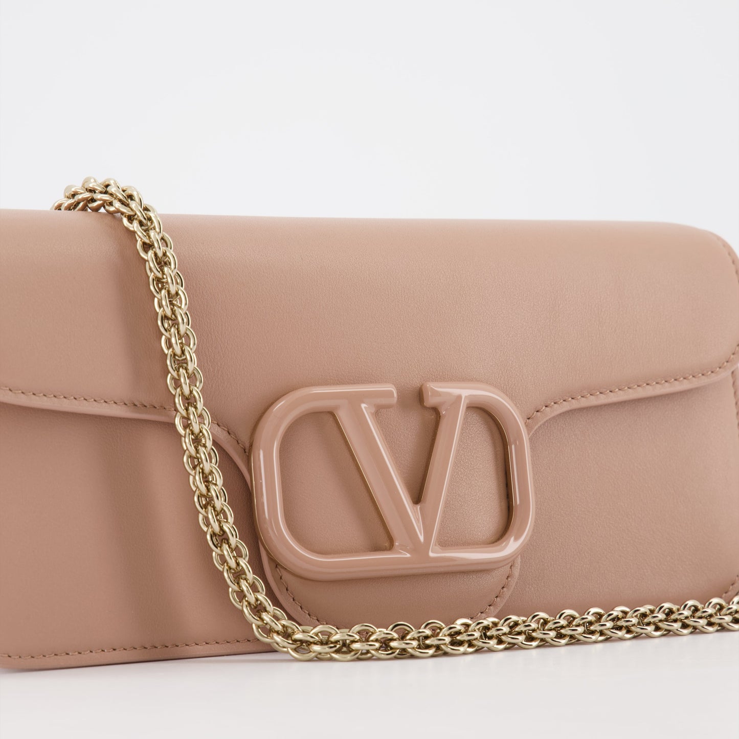 luxury handbag, Valentino Garavani, pink leather bag, designer accessory, women's crossbody bag