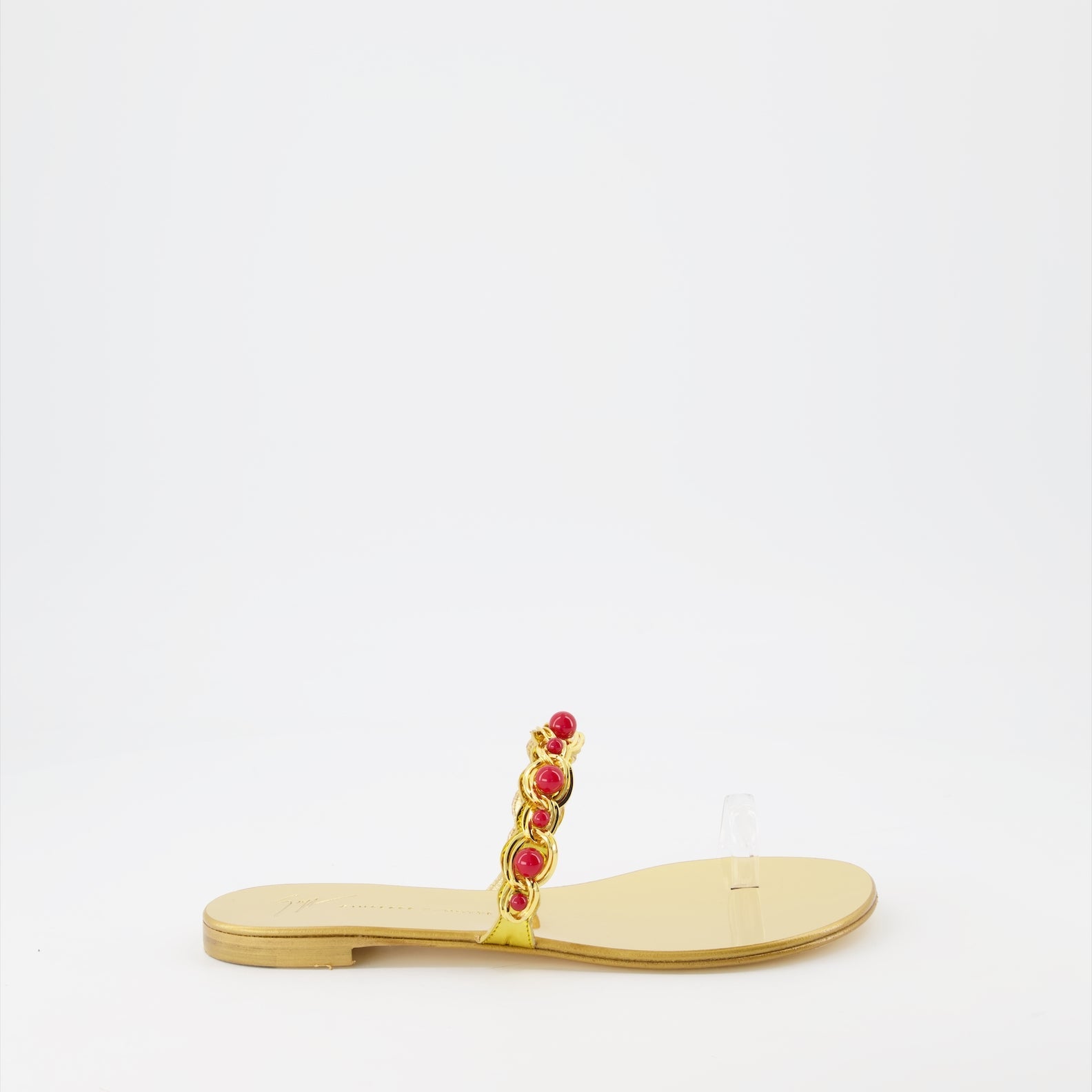 golden sandals, Giuseppe Zanotti, luxury footwear, women's designer sandals, high-end fashion