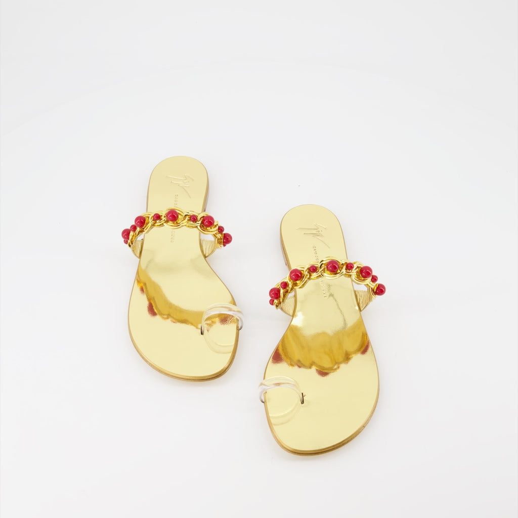 golden sandals, Giuseppe Zanotti, luxury footwear, women's designer sandals, high-end fashion