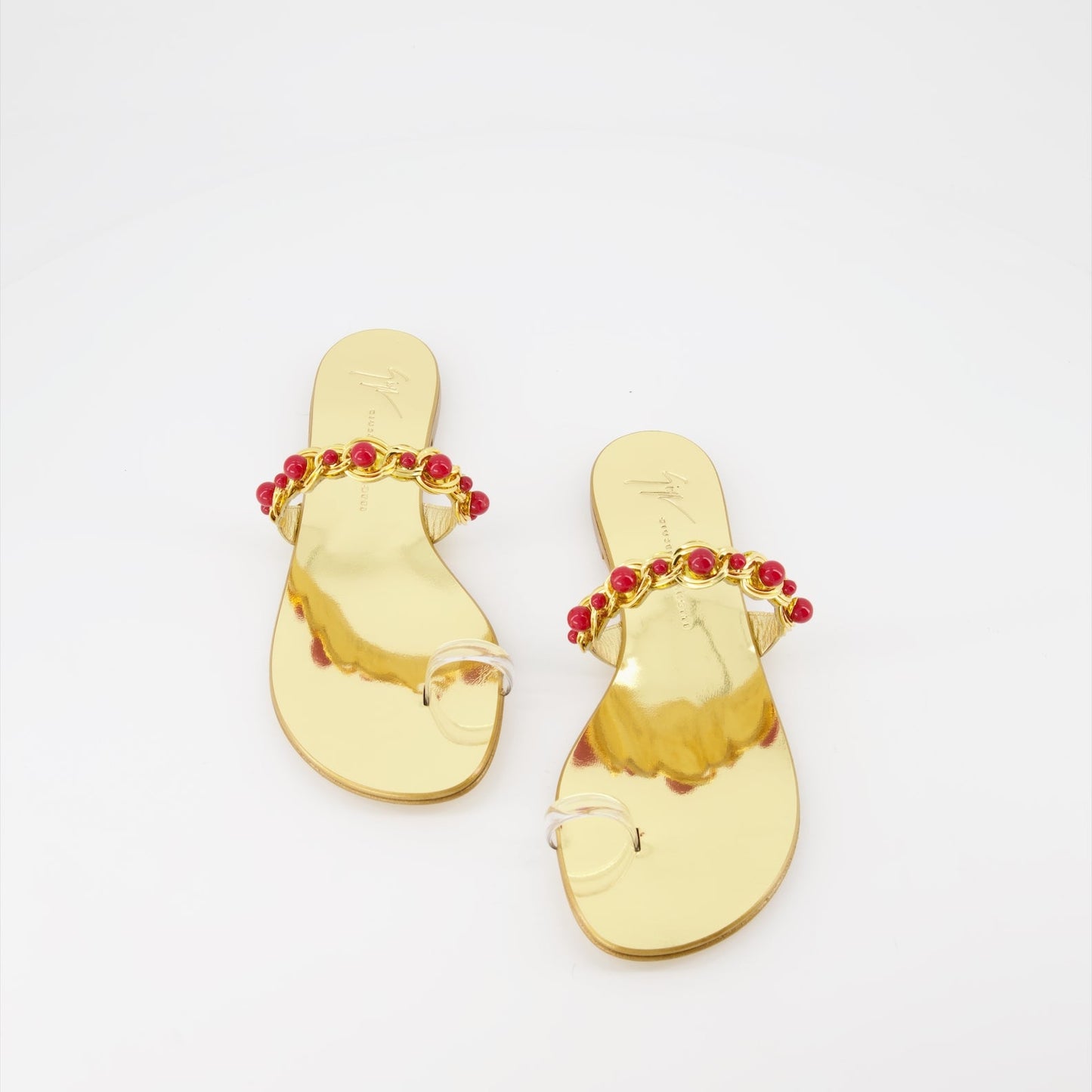 golden sandals, Giuseppe Zanotti, luxury footwear, women's designer sandals, high-end fashion