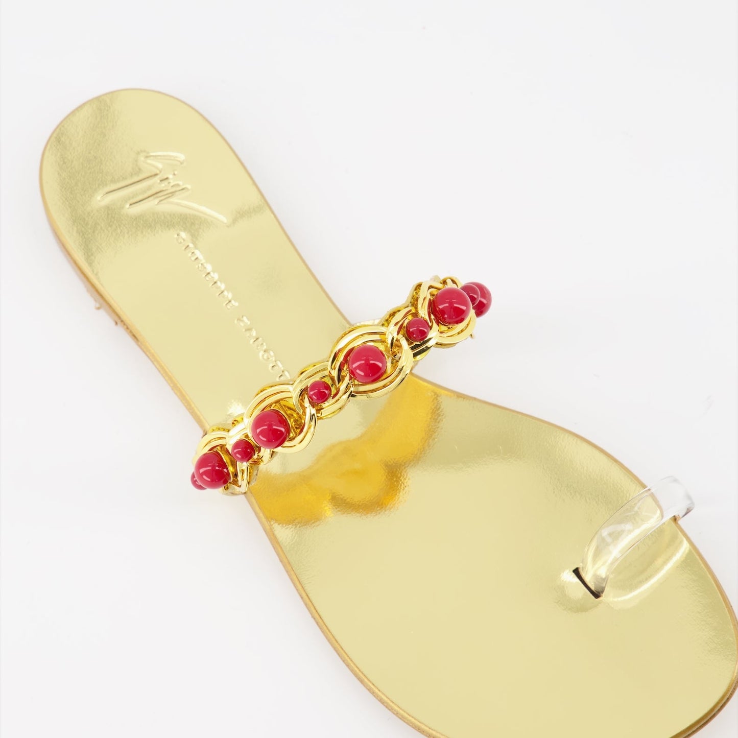 golden sandals, Giuseppe Zanotti, luxury footwear, women's designer sandals, high-end fashion