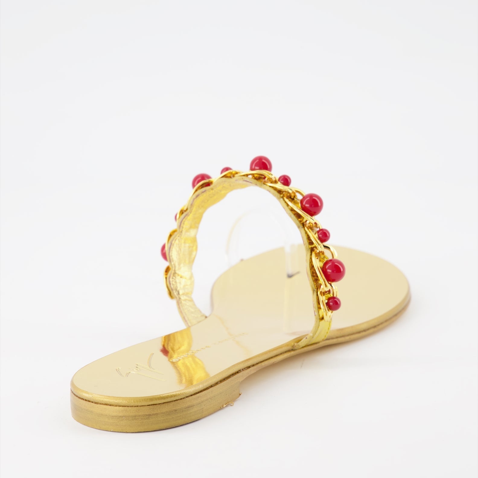 golden sandals, Giuseppe Zanotti, luxury footwear, women's designer sandals, high-end fashion