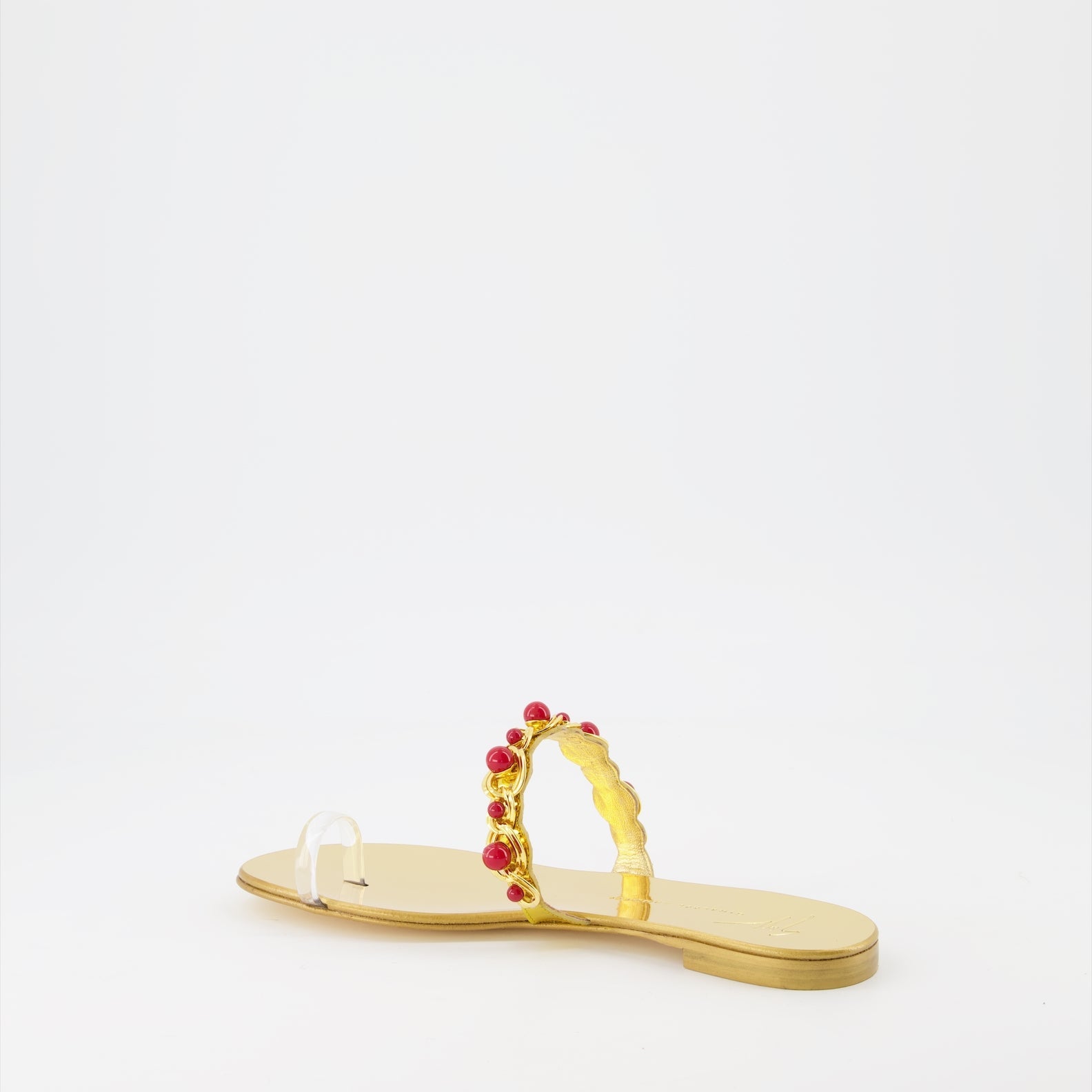 golden sandals, Giuseppe Zanotti, luxury footwear, women's designer sandals, high-end fashion