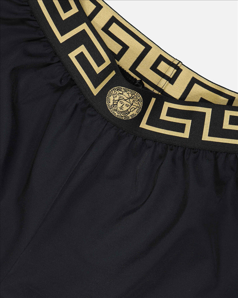 Versace swim shorts, Women's luxury swimwear, Black Medusa shorts, Designer beachwear, High-end women's fashion