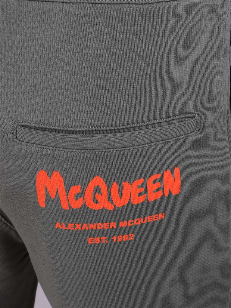 Alexander McQueen, graffiti logo, jogging pants, luxury fashion, women's athleisure